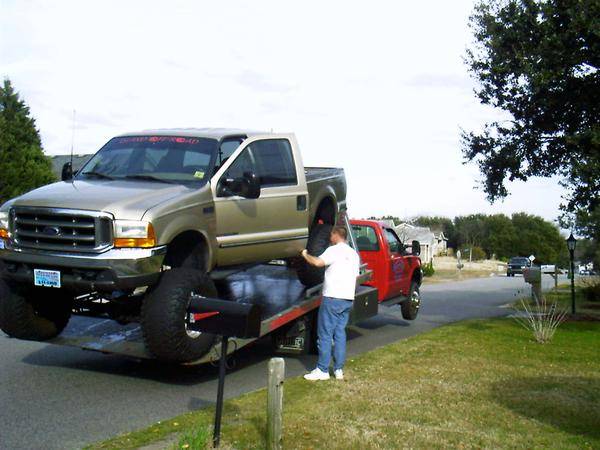 350 got the tow truck doin a wheelie.jpg