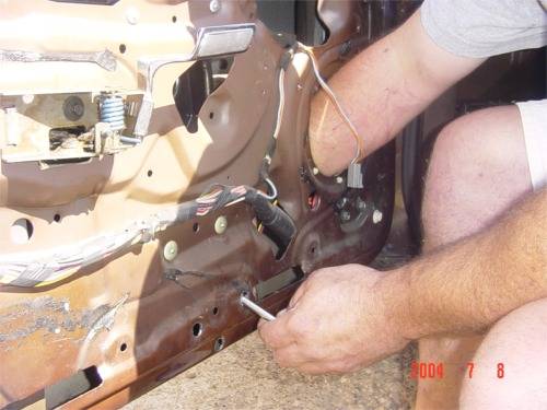 Taking out Bolts Adjusting Motor.JPG